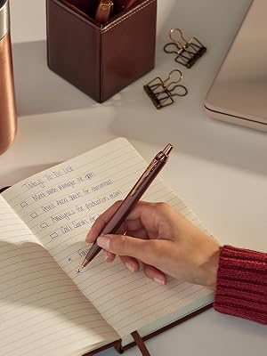 Parker IM Monochrome ballpoint pen writing to-do list in notebook