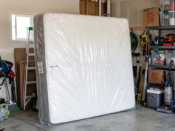 King-size plastic mattress protector is waterproof and durable.