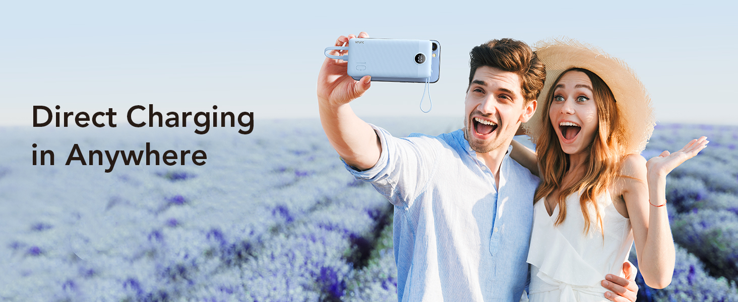 a man taking a picture of a lavender field