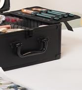 Corner view of an open black briefcase or carrying case against a light background.