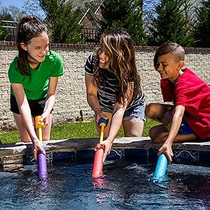 Family Filling Up Max Liquidator Water Blasters on Pool Side
