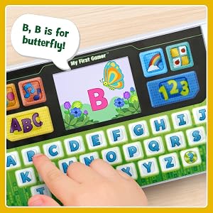 Kid presses the B on the keyboard. Toy says B, B is for butterfly! A colorful animation plays.