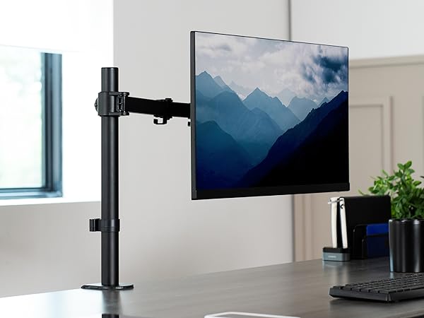 Singe monitor mount clamped to desktop with ultrawide screen