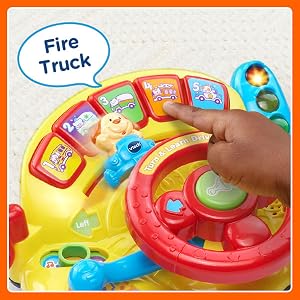 Kid presses the 4th button on Turn & Learn Driver. Toy says: Fire truck!