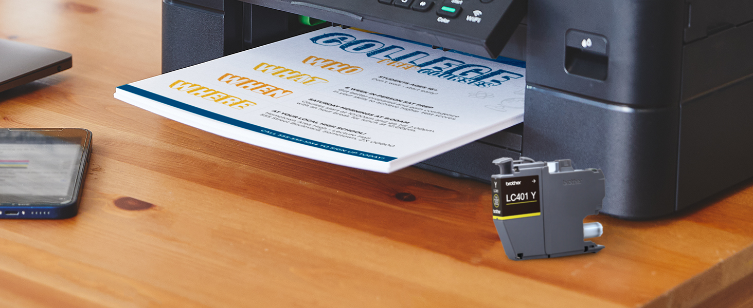 LC401 ink cartridge in front of Brother printer