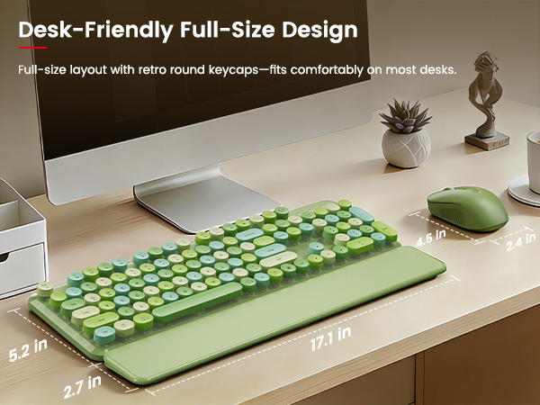 Green full-size keyboard and mouse with wrist rest shown in a desk-friendly layout