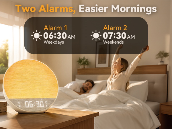 Dual alarm clock sunrise wake up light for couples with separate weekday and weekend schedules.