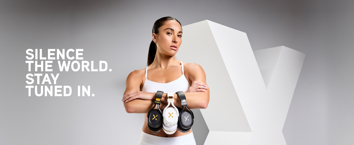 Woman in white activewear holds 3 Pump X headphones in against a large X backdrop
