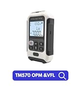 Handheld digital device with large LCD screen displaying measurement values. White and gray body with buttons for operation. Model TM570 OPM &VFL.