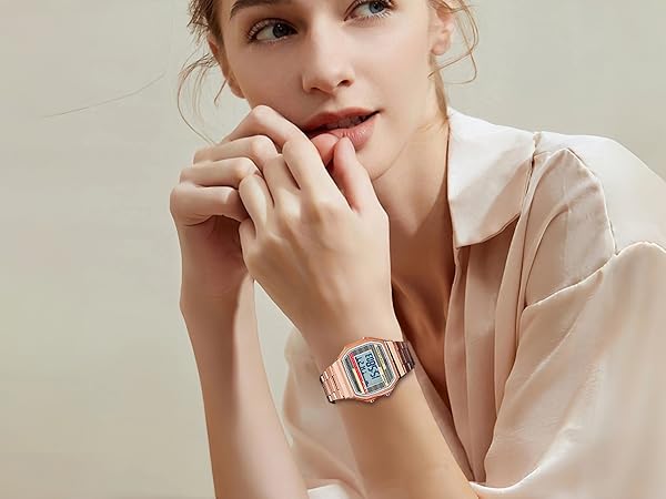 Woman wearing a rose gold square digital watch retro unisex digital watch with clear digital display