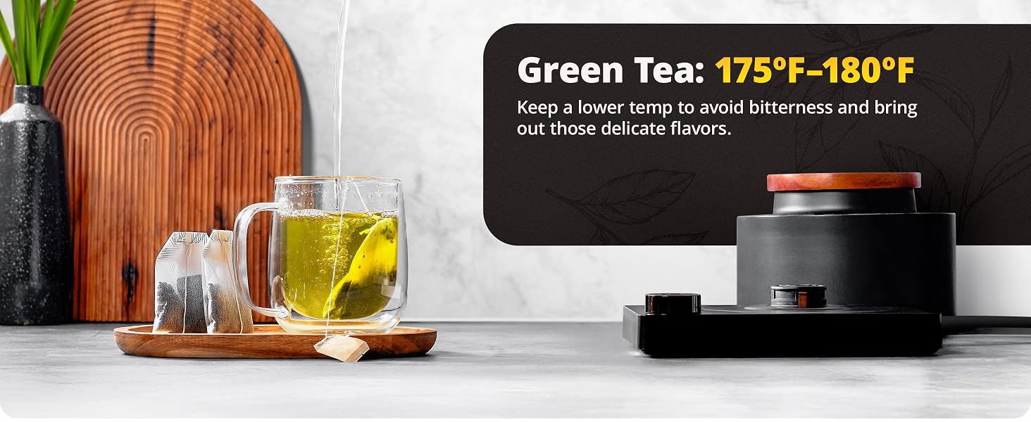 water falling into cup with teabag making green tea