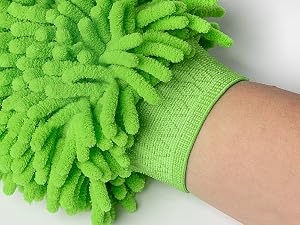 Lime green microfiber cleaning mitt shown on a hand, featuring dense shaggy tendrils for dusting and cleaning. Elastic cuff provides secure fit.