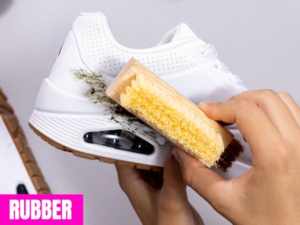 A shoe brush safe for rubber, canvas, leather, and more
