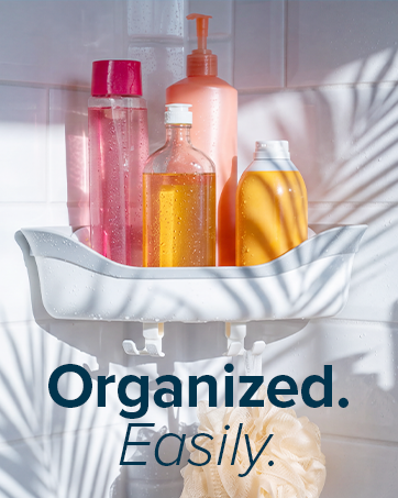 corner basket with shampoo bottles and soap on smooth tile