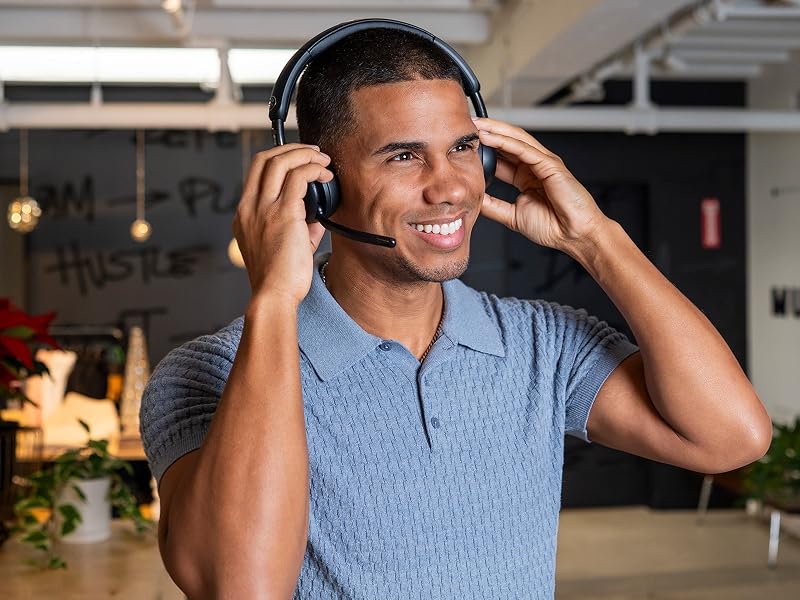 A man comfortably wearing the go work 3 in an office setting