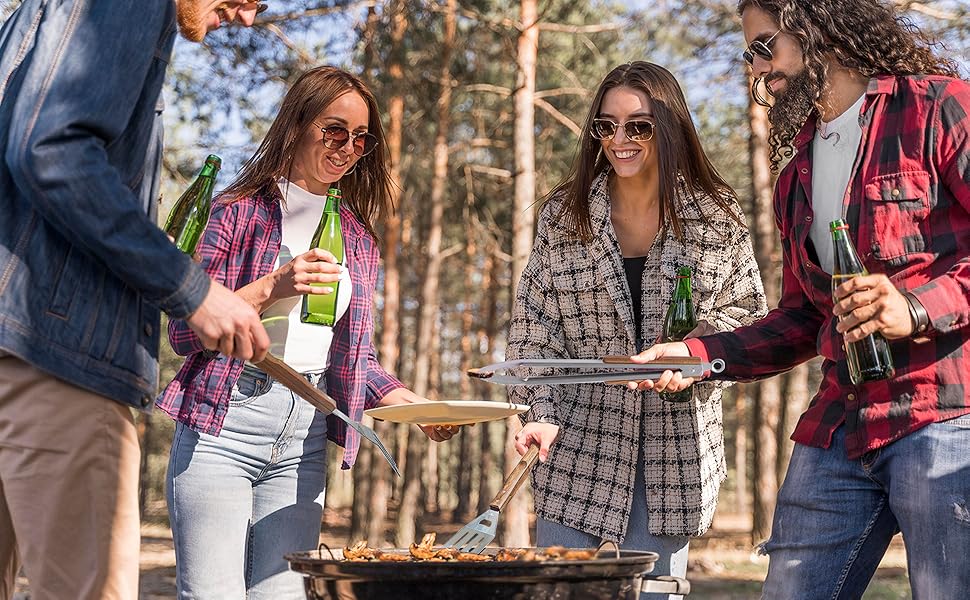 Outdoor BBQ activity with professional BBQ tools