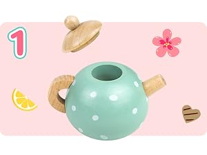 a teapot and a flower on a pink background
