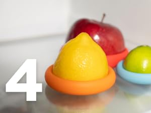 Fresh fruits and vegetables are saved in silicone food savers in the fridge to keep organized