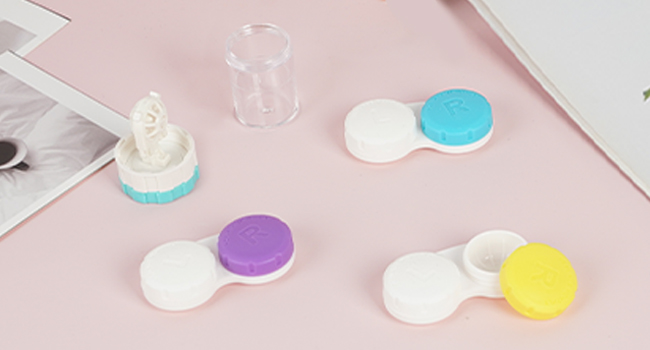 Contact lens container and solution bottle