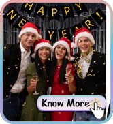 Group photo of people wearing Santa hats. 'Happy Holidays' text and decorations visible. 'Know More' button in foreground.