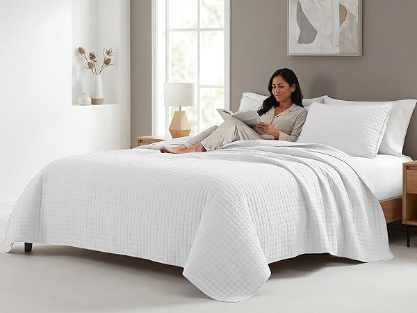 King size quilt bedding set in white with oversized hotel style coverage