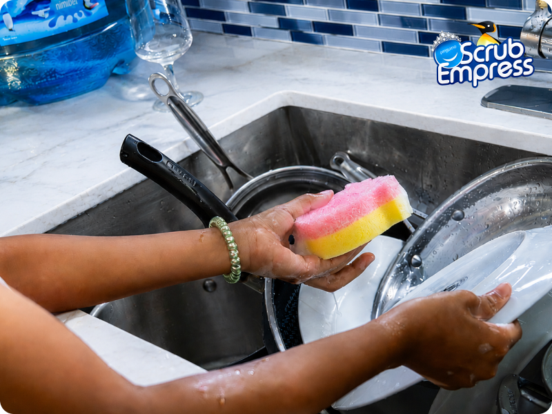 Soft absorbent sponge with powerful scrub side for dishes cookware and pet bowls
