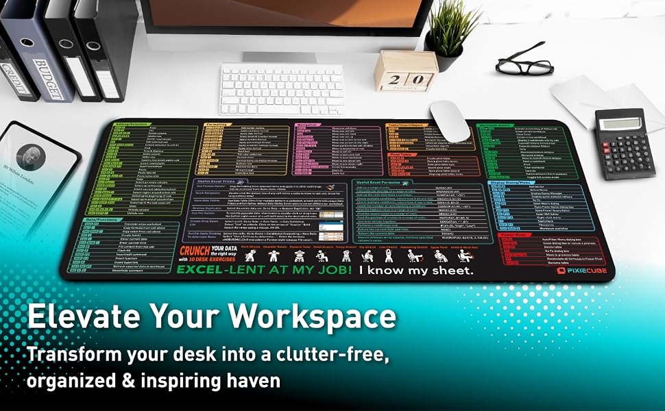 Text reads 'Elevate Your Workspace Transform your desk into a clutter-free, organized & inspiring haven'. Large desk mat showing colorful keyboard shortcuts and commands on black background.