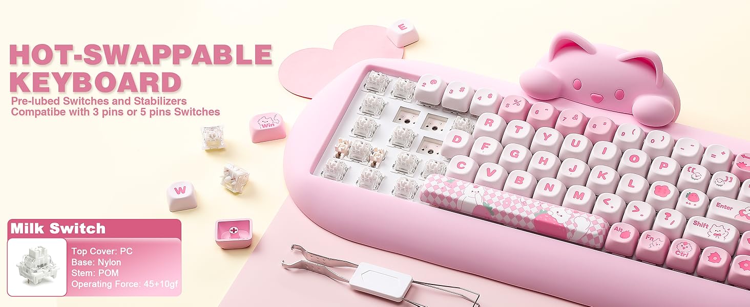 Text reads 'HOT-SWAPPABLE KEYBOARD'. Pink mechanical keyboard with removable keycaps scattered around it and 'Milk Switch' label visible. Compact layout keyboard with hot-swappable switch mechanism displayed.