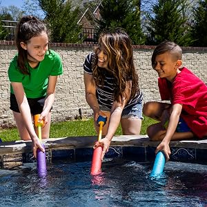 Family Filling Up Max Liquidator Water Blasters on Pool Side
