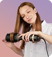 woman using hot air brush