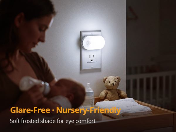 Eye-caring nursery plug-in night light with frosted cover.