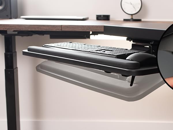 Keyboard tray height adjustment