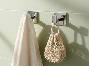 Series of pendant light fixtures shown in natural lighting against light-colored wall, displaying various woven or textured lampshade designs.