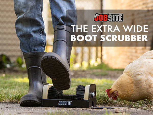 A person scrubs mud off their rain boots next to a chicken grazing. Text reads "extra wide scrubber"