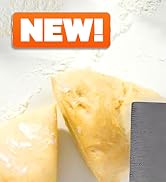 stainless steel bench scraper used to lift and portion dough on baking surface