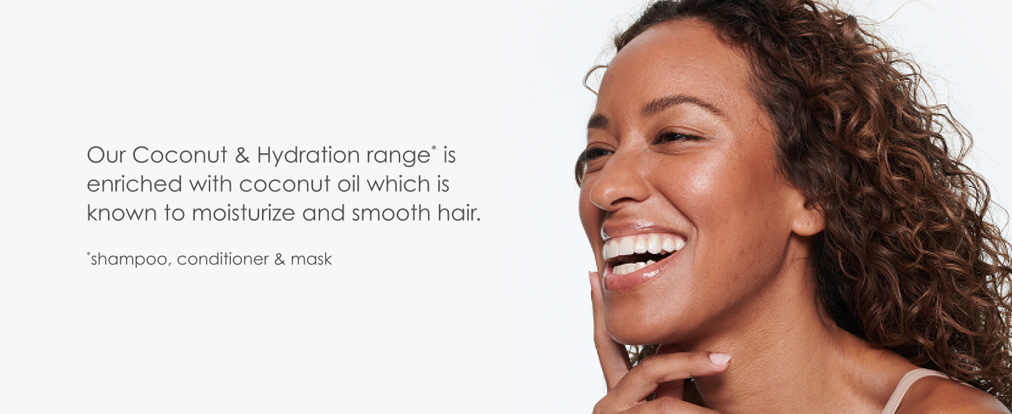 Woman smiling with curly, healthy-looking hair next to text.
