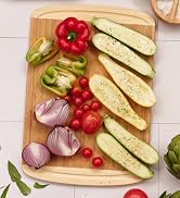 kona groove bamboo cutting board with juice groove with sliced vegetables