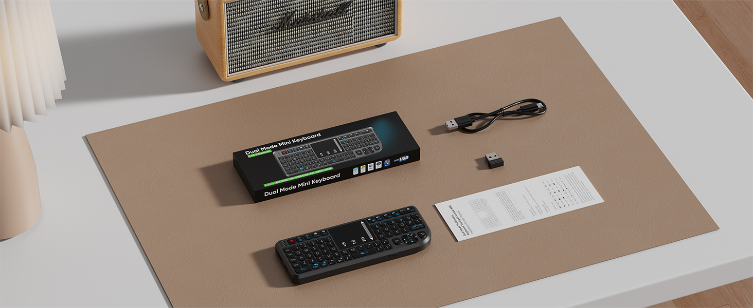 Package Contents: Mini keyboard, instruction manual, charging cable, receiver