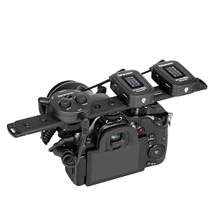 Micro-Mixer mounted on a Camera with Shotgun and Wireless System plugged in to mixer