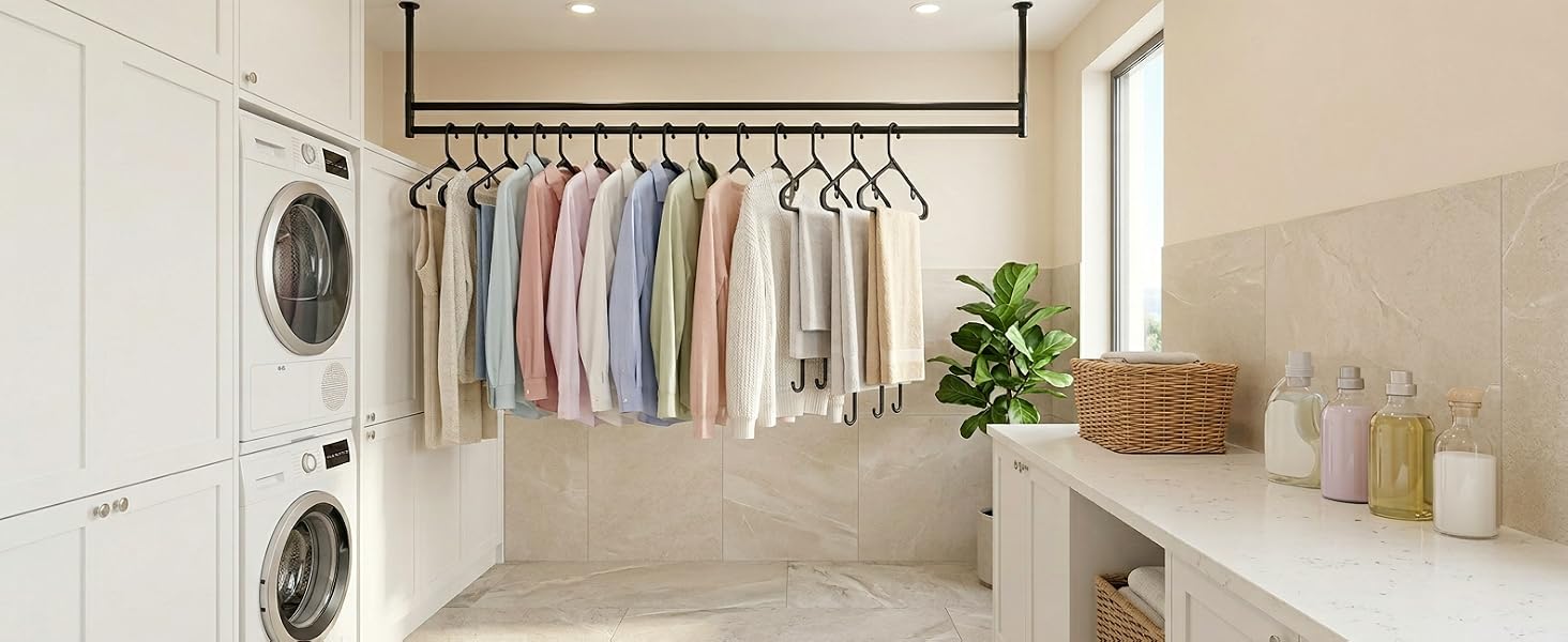 Laundry room: transferring dry clothes onto black hangers straight from dryer. No wrinkling