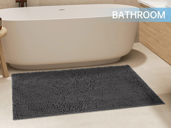 A chenille doormat is placed in the bathroom.