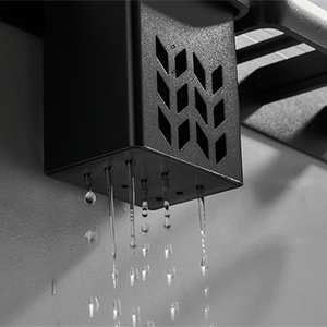 a close up of water dripping from a metal box
