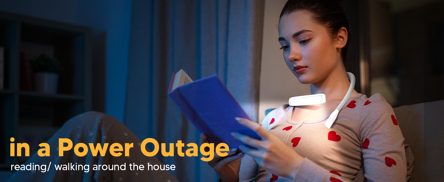 A young woman is studying bible during a power outage with EastPin reading light neck book light on