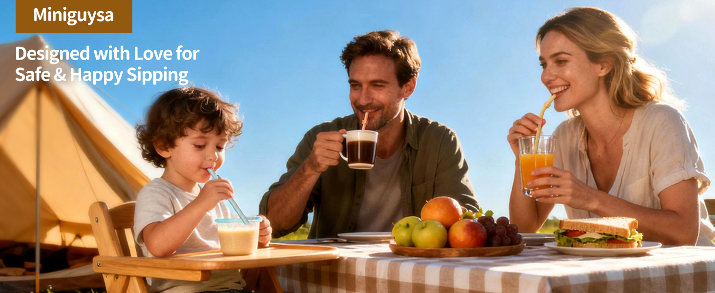 Happy family using Miniguysa reusable silicone straws for kids & adults during an outdoor picnic.
