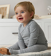 baby wearing mix and match gray bodysuit with pants