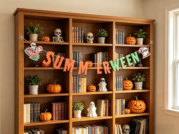 Paper banner layered over shelves, ghost and pumpkin print visible.