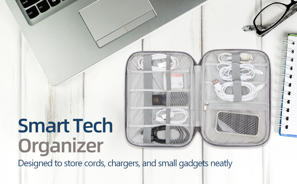 Smart tech organizer keeping cords chargers and mouse neat next to laptop for digital nomads