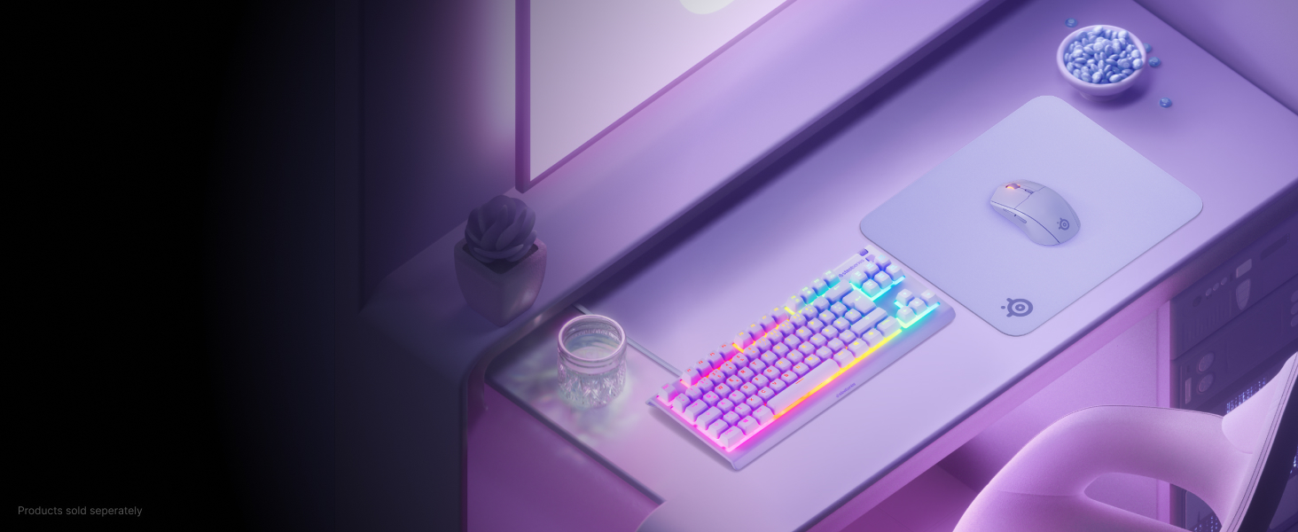 Desktop setup with a keyboard, mouse, headset, and mouse pad