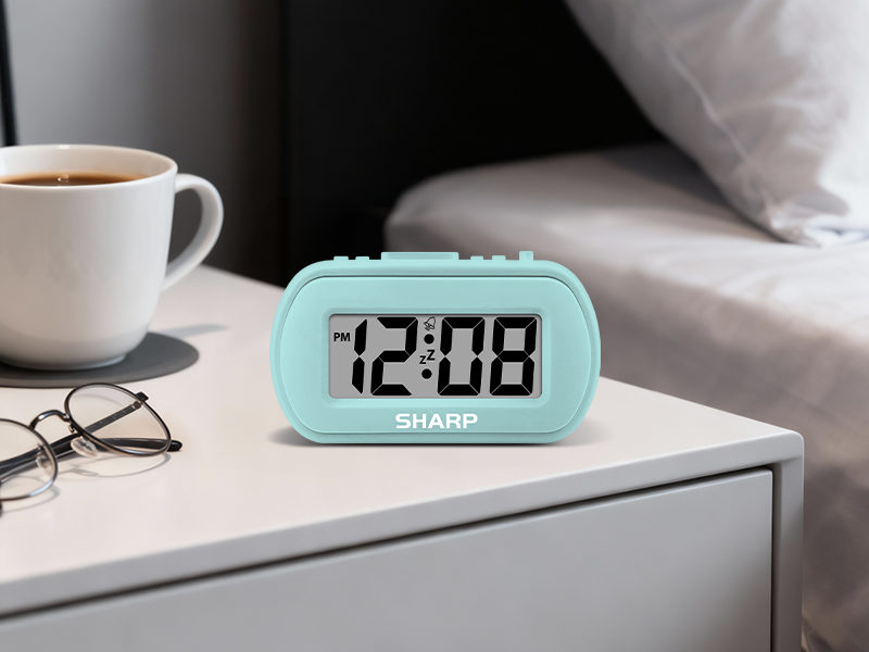 Sharp SPC483 battery powered alarm clock rubberized rubber small compact