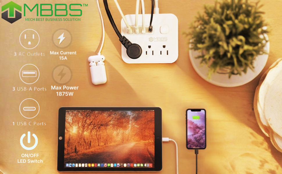 3 AC outlets, 3 USB-A ports, 1 USB-C port, charging phone and tablet on a desk